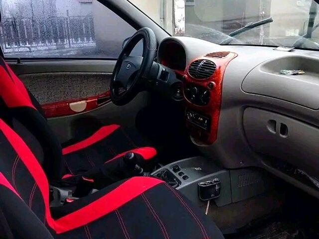 Красный ВАЗ Kalina, объемом двигателя 1.6 л и пробегом 240 тыс. км за 1300 $, фото 7 на Automoto.ua