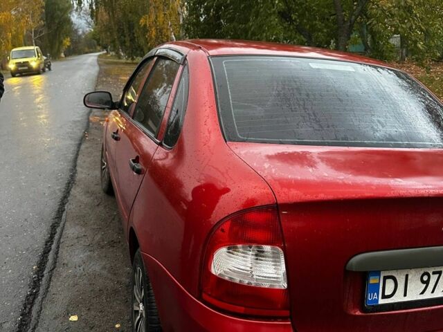 Красный ВАЗ Калина, объемом двигателя 1.6 л и пробегом 150 тыс. км за 2200 $, фото 2 на Automoto.ua