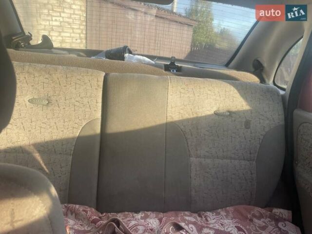 Красный ВАЗ Калина, объемом двигателя 1.6 л и пробегом 150 тыс. км за 1200 $, фото 1 на Automoto.ua