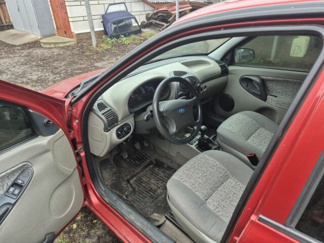 Красный ВАЗ Калина, объемом двигателя 1.6 л и пробегом 160 тыс. км за 1450 $, фото 5 на Automoto.ua