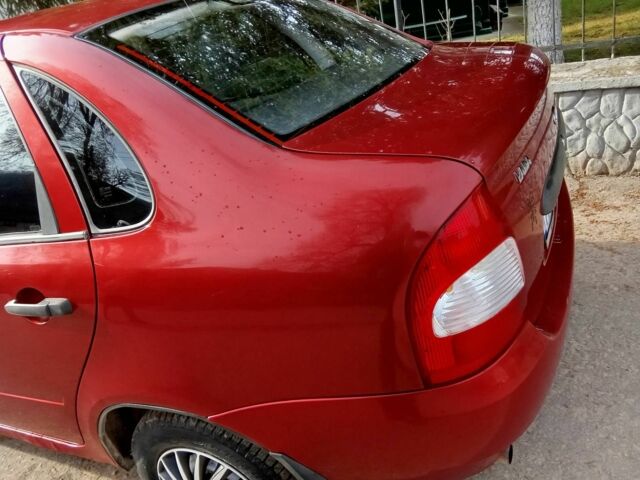 Красный ВАЗ Калина, объемом двигателя 1.5 л и пробегом 135 тыс. км за 1650 $, фото 5 на Automoto.ua