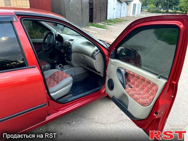 Красный ВАЗ Kalina, объемом двигателя 1.6 л и пробегом 220 тыс. км за 2299 $, фото 9 на Automoto.ua