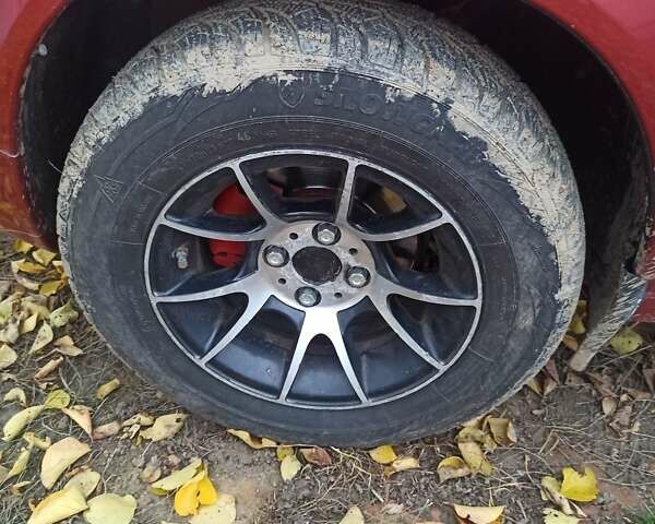 Красный ВАЗ Калина, объемом двигателя 1.6 л и пробегом 180 тыс. км за 1850 $, фото 4 на Automoto.ua