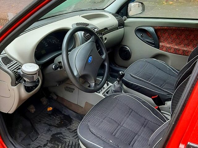 Красный ВАЗ Калина, объемом двигателя 1.6 л и пробегом 124 тыс. км за 2800 $, фото 5 на Automoto.ua