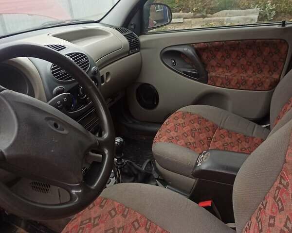 Красный ВАЗ Калина, объемом двигателя 1.6 л и пробегом 180 тыс. км за 1850 $, фото 3 на Automoto.ua