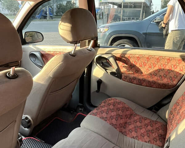 Красный ВАЗ Калина, объемом двигателя 1.39 л и пробегом 217 тыс. км за 2200 $, фото 10 на Automoto.ua