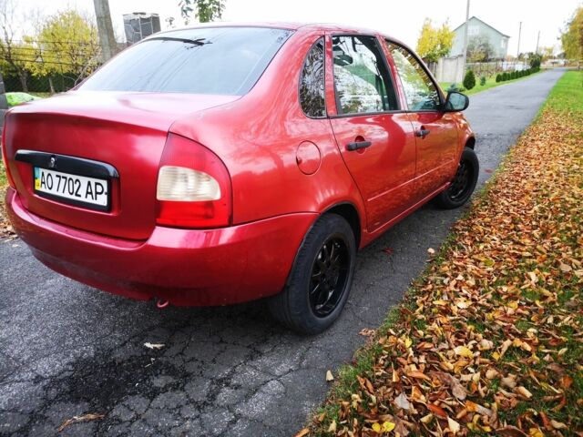 Красный ВАЗ Калина, объемом двигателя 1 л и пробегом 200 тыс. км за 1400 $, фото 4 на Automoto.ua