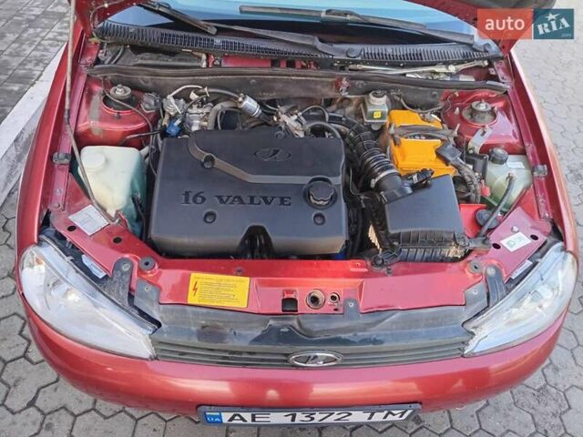 Красный ВАЗ Калина, объемом двигателя 1.39 л и пробегом 117 тыс. км за 2800 $, фото 1 на Automoto.ua