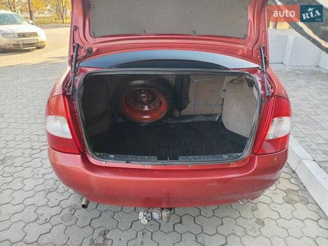 Красный ВАЗ Калина, объемом двигателя 1.39 л и пробегом 117 тыс. км за 2800 $, фото 2 на Automoto.ua