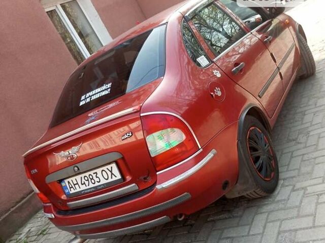 Красный ВАЗ Калина, объемом двигателя 1.39 л и пробегом 160 тыс. км за 3000 $, фото 2 на Automoto.ua
