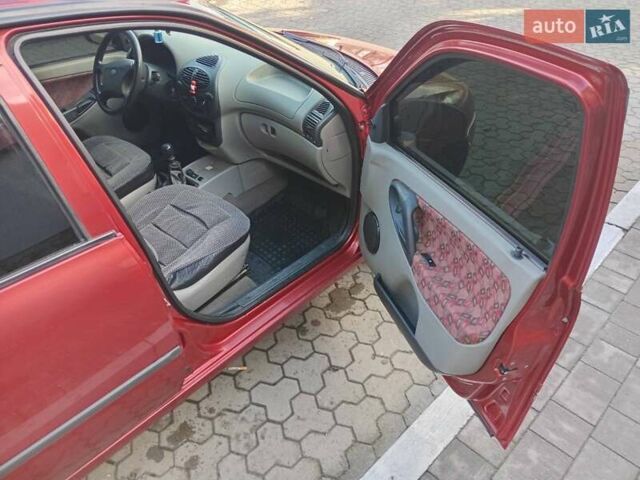 Красный ВАЗ Калина, объемом двигателя 1.39 л и пробегом 117 тыс. км за 2800 $, фото 6 на Automoto.ua