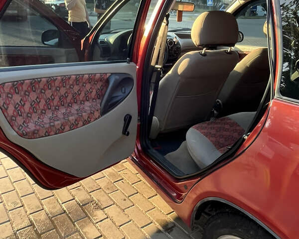 Красный ВАЗ Калина, объемом двигателя 1.39 л и пробегом 217 тыс. км за 2200 $, фото 11 на Automoto.ua