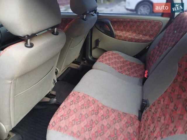 Красный ВАЗ Калина, объемом двигателя 1.6 л и пробегом 111 тыс. км за 2800 $, фото 18 на Automoto.ua