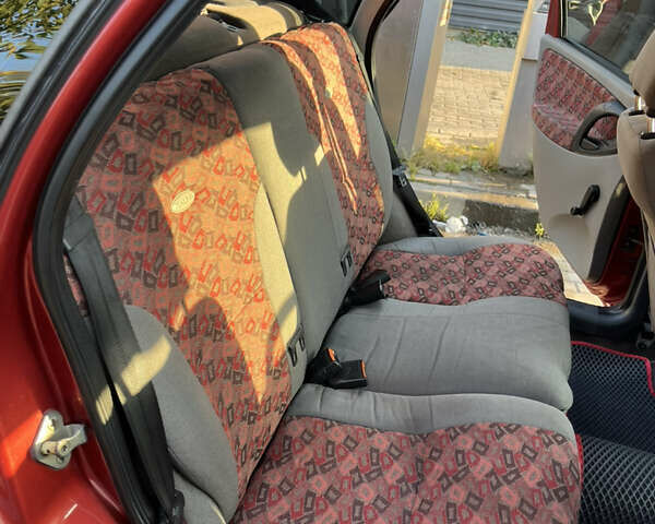 Красный ВАЗ Калина, объемом двигателя 1.39 л и пробегом 217 тыс. км за 2200 $, фото 21 на Automoto.ua