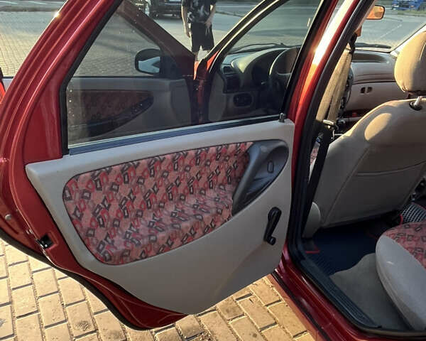 Красный ВАЗ Калина, объемом двигателя 1.39 л и пробегом 217 тыс. км за 2200 $, фото 16 на Automoto.ua