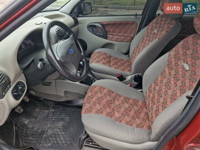 Красный ВАЗ Калина, объемом двигателя 1.4 л и пробегом 109 тыс. км за 3499 $, фото 12 на Automoto.ua