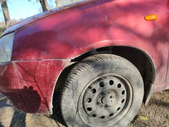 Красный ВАЗ Калина, объемом двигателя 1.4 л и пробегом 196 тыс. км за 1250 $, фото 6 на Automoto.ua