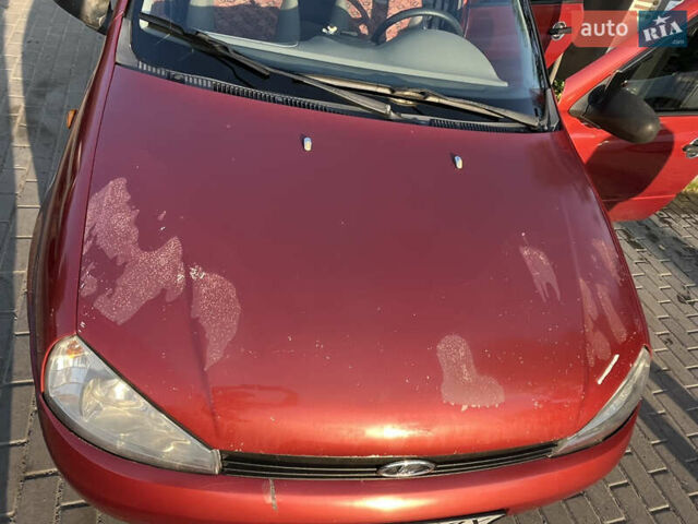 Красный ВАЗ Калина, объемом двигателя 1.39 л и пробегом 217 тыс. км за 2200 $, фото 7 на Automoto.ua