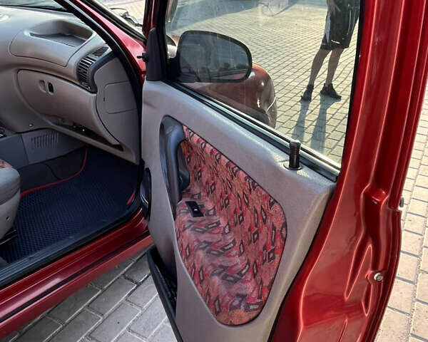 Красный ВАЗ Калина, объемом двигателя 1.39 л и пробегом 217 тыс. км за 2200 $, фото 19 на Automoto.ua