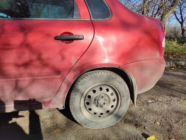 Красный ВАЗ Калина, объемом двигателя 1.4 л и пробегом 196 тыс. км за 1250 $, фото 7 на Automoto.ua