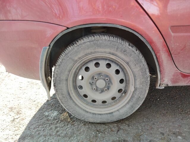 Красный ВАЗ Калина, объемом двигателя 1.4 л и пробегом 196 тыс. км за 1250 $, фото 5 на Automoto.ua