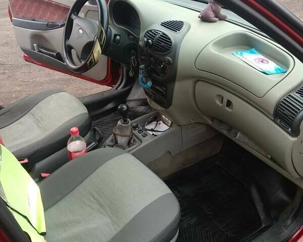 Красный ВАЗ Калина, объемом двигателя 1.6 л и пробегом 114 тыс. км за 2850 $, фото 5 на Automoto.ua