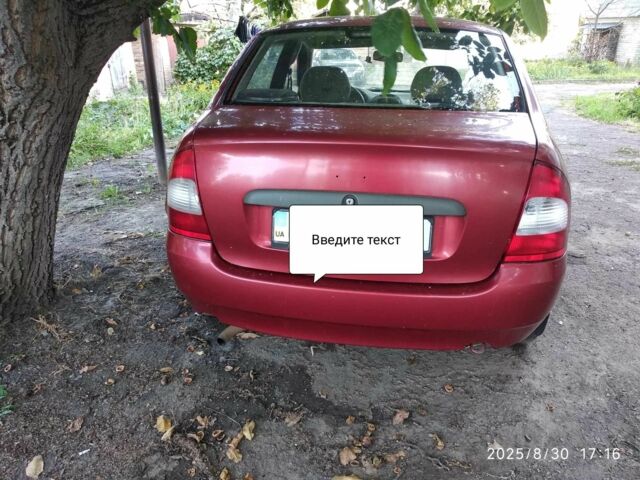 Червоний ВАЗ Калина, об'ємом двигуна 1.6 л та пробігом 280 тис. км за 1350 $, фото 1 на Automoto.ua