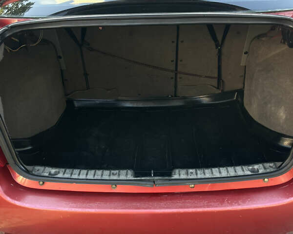 Красный ВАЗ Калина, объемом двигателя 1.39 л и пробегом 217 тыс. км за 2200 $, фото 23 на Automoto.ua