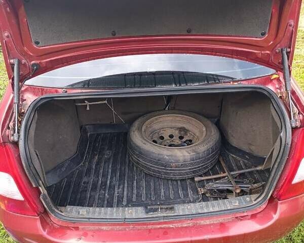 Красный ВАЗ Калина, объемом двигателя 1.39 л и пробегом 260 тыс. км за 2200 $, фото 6 на Automoto.ua