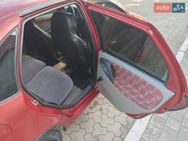 Красный ВАЗ Калина, объемом двигателя 1.39 л и пробегом 117 тыс. км за 2800 $, фото 5 на Automoto.ua