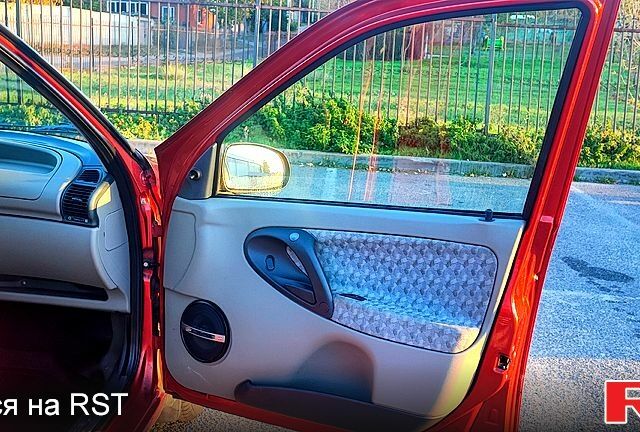 Красный ВАЗ Kalina, объемом двигателя 1.6 л и пробегом 171 тыс. км за 2500 $, фото 7 на Automoto.ua