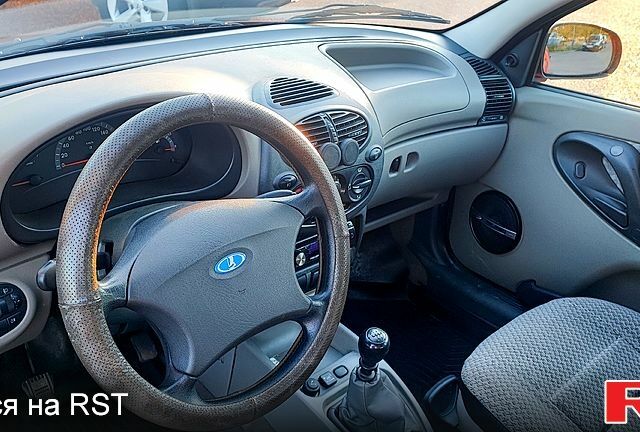 Красный ВАЗ Kalina, объемом двигателя 1.6 л и пробегом 171 тыс. км за 2500 $, фото 8 на Automoto.ua