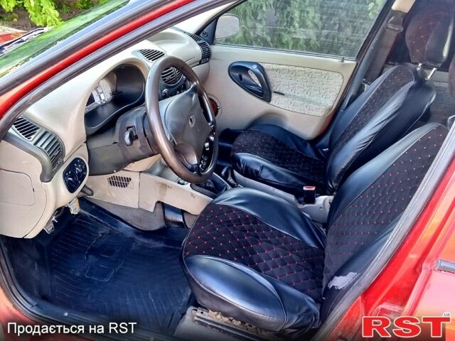 Красный ВАЗ Kalina, объемом двигателя 1.6 л и пробегом 200 тыс. км за 1350 $, фото 5 на Automoto.ua