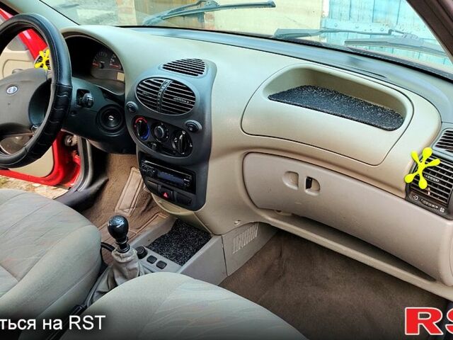 Красный ВАЗ Kalina, объемом двигателя 1.4 л и пробегом 214 тыс. км за 2300 $, фото 6 на Automoto.ua