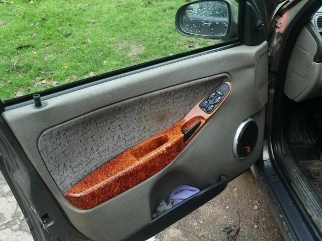 Серый ВАЗ Калина, объемом двигателя 1.6 л и пробегом 300 тыс. км за 2300 $, фото 4 на Automoto.ua