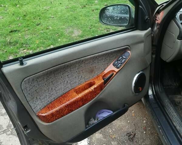 Серый ВАЗ Калина, объемом двигателя 1.6 л и пробегом 300 тыс. км за 2300 $, фото 16 на Automoto.ua