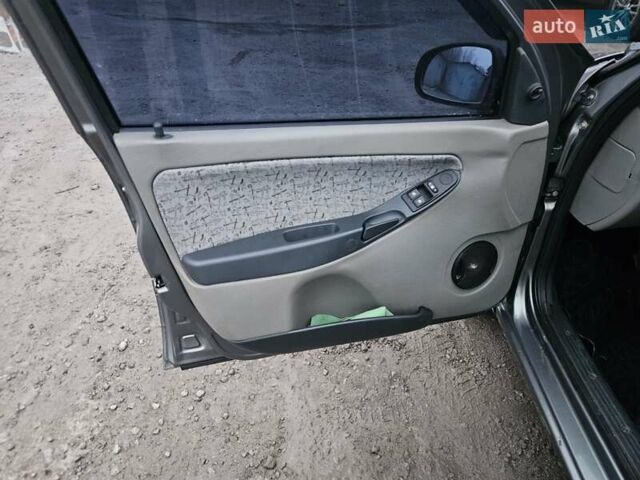 Сірий ВАЗ Калина, об'ємом двигуна 1.6 л та пробігом 100 тис. км за 1800 $, фото 4 на Automoto.ua