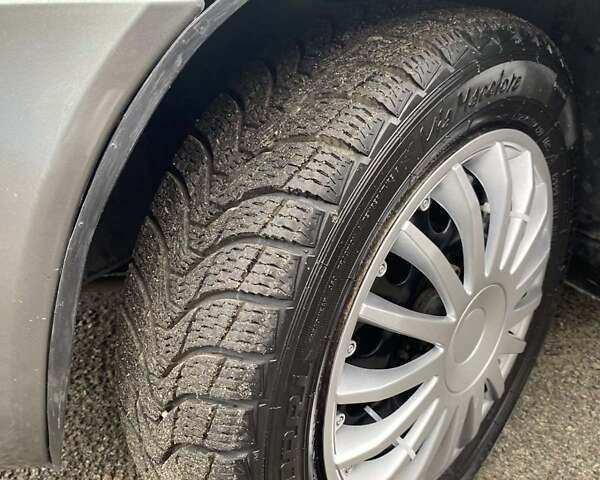 Серый ВАЗ Калина, объемом двигателя 1.4 л и пробегом 184 тыс. км за 2350 $, фото 11 на Automoto.ua