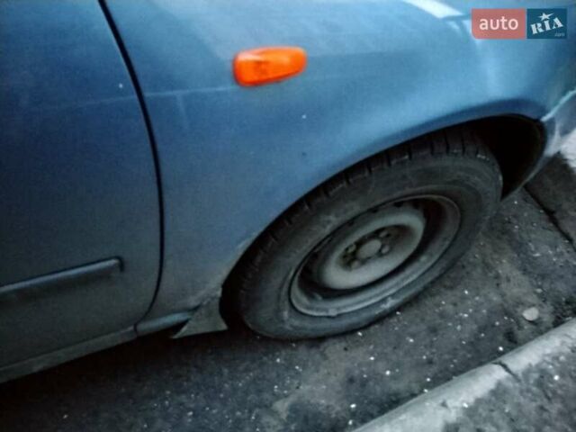 Синий ВАЗ Калина, объемом двигателя 1.6 л и пробегом 218 тыс. км за 1100 $, фото 5 на Automoto.ua