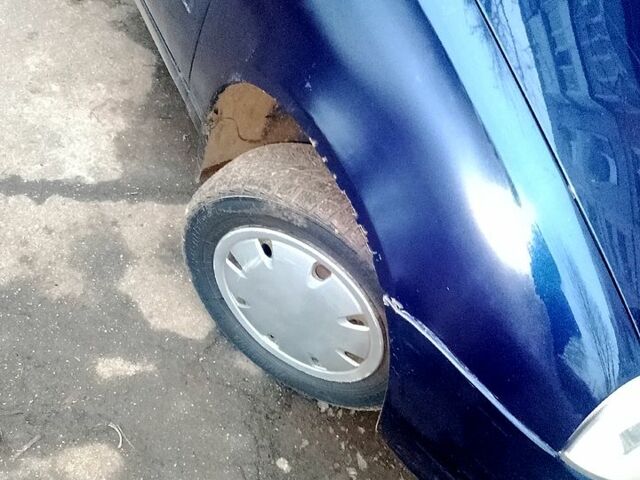 Синий ВАЗ Kalina, объемом двигателя 1.4 л и пробегом 180 тыс. км за 2400 $, фото 2 на Automoto.ua