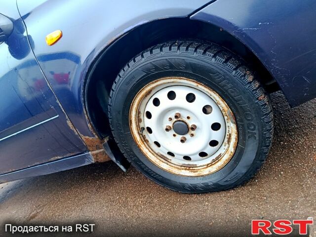 Синий ВАЗ Kalina, объемом двигателя 1.6 л и пробегом 300 тыс. км за 1300 $, фото 8 на Automoto.ua