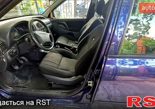 Синій ВАЗ Kalina, об'ємом двигуна 1.4 л та пробігом 670 тис. км за 3599 $, фото 6 на Automoto.ua