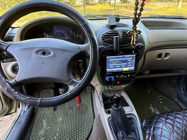 Зеленый ВАЗ Kalina, объемом двигателя 1.4 л и пробегом 174 тыс. км за 1680 $, фото 3 на Automoto.ua