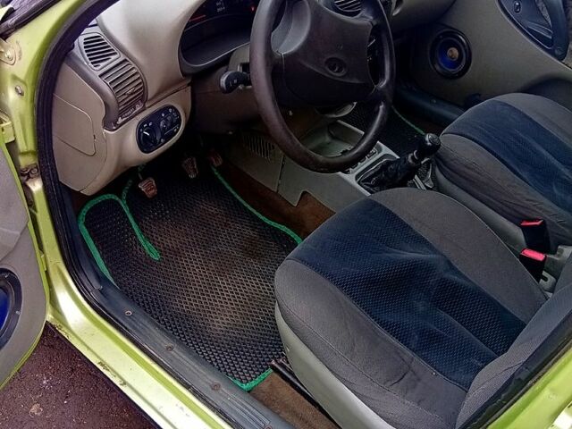 Зелений ВАЗ Kalina, об'ємом двигуна 1.5 л та пробігом 221 тис. км за 1400 $, фото 4 на Automoto.ua