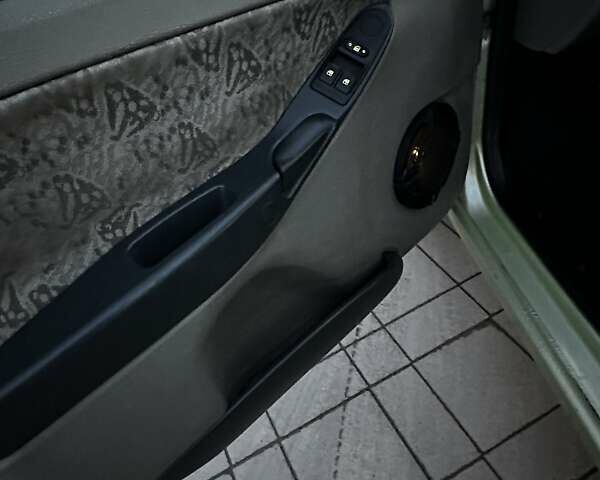 Зеленый ВАЗ Калина, объемом двигателя 1.6 л и пробегом 175 тыс. км за 1550 $, фото 20 на Automoto.ua