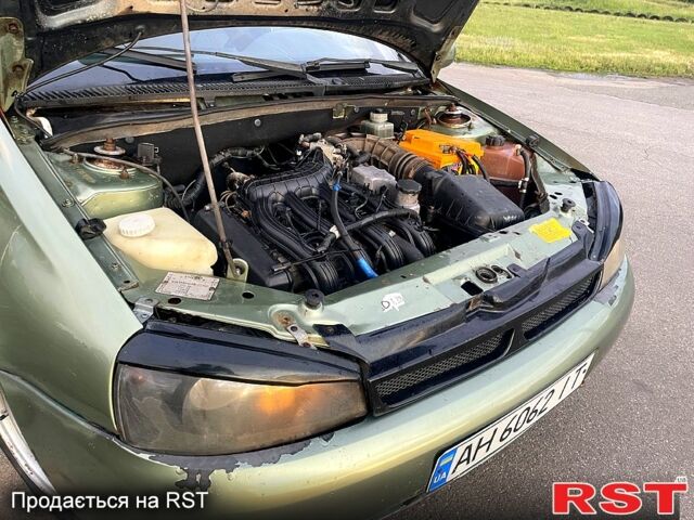 Зелений ВАЗ Kalina, об'ємом двигуна 1.6 л та пробігом 120 тис. км за 1600 $, фото 8 на Automoto.ua