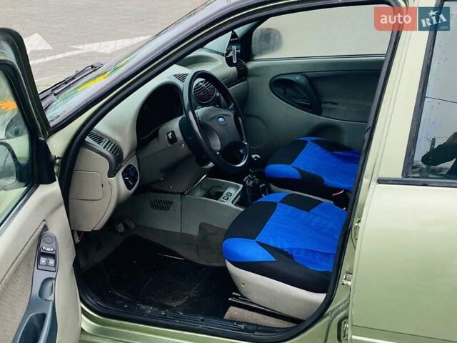 Зеленый ВАЗ Калина, объемом двигателя 1.6 л и пробегом 171 тыс. км за 1750 $, фото 9 на Automoto.ua