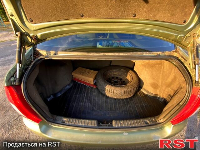 Зеленый ВАЗ Kalina, объемом двигателя 1.4 л и пробегом 360 тыс. км за 1050 $, фото 4 на Automoto.ua