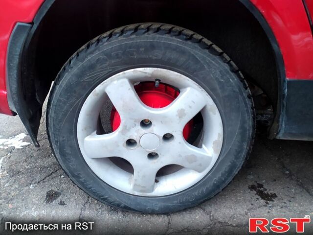 Червоний ВАЗ Lada Kalina, об'ємом двигуна 1.6 л та пробігом 230 тис. км за 2600 $, фото 5 на Automoto.ua