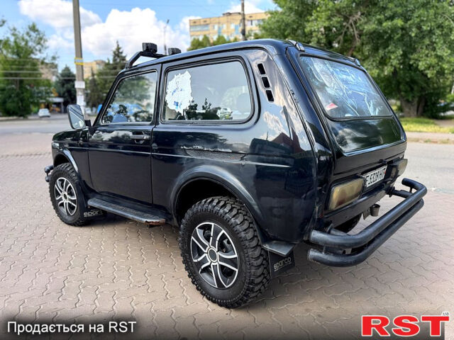 Черный ВАЗ Нива, объемом двигателя 1.6 л и пробегом 183 тыс. км за 2300 $, фото 4 на Automoto.ua